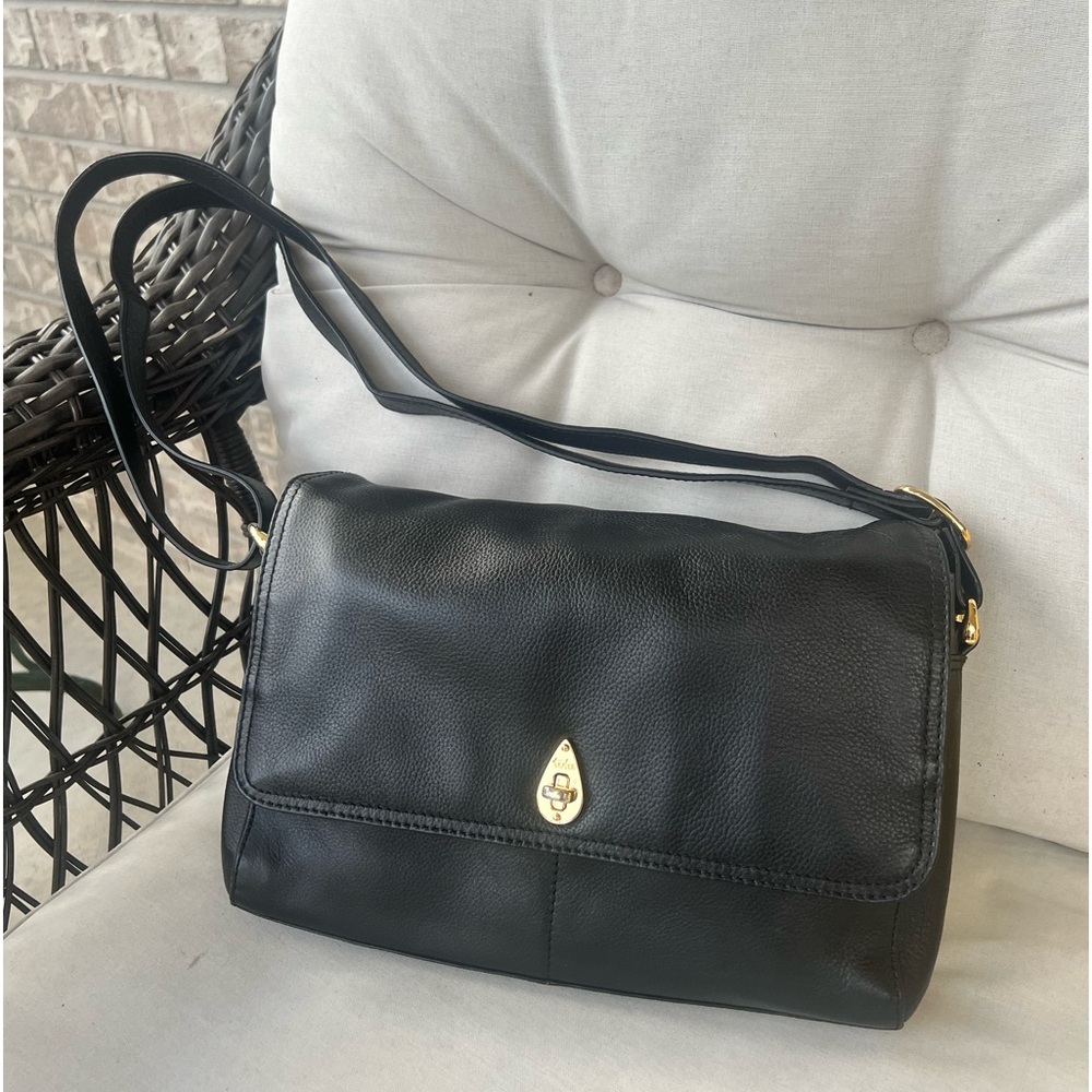 Like new Tula bag with gold clip and adjustable straps for shoulder/cross body.